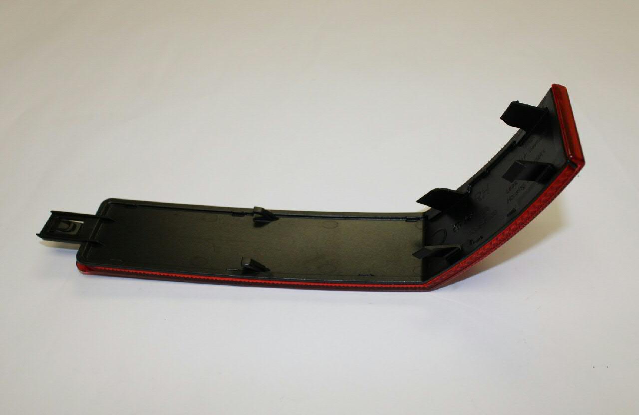 Compre 7C0945106 VAG Retrorrefletor (refletor) do pára-choque traseiro direito