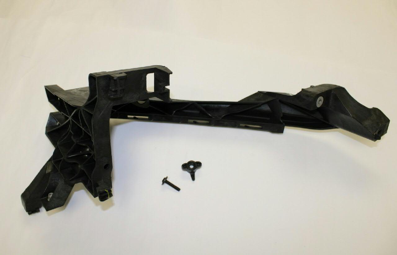 Consola (adaptador) de fixação da luz dianteira esquerda VAG 80A805607 preço, a partir de 50,21 USD